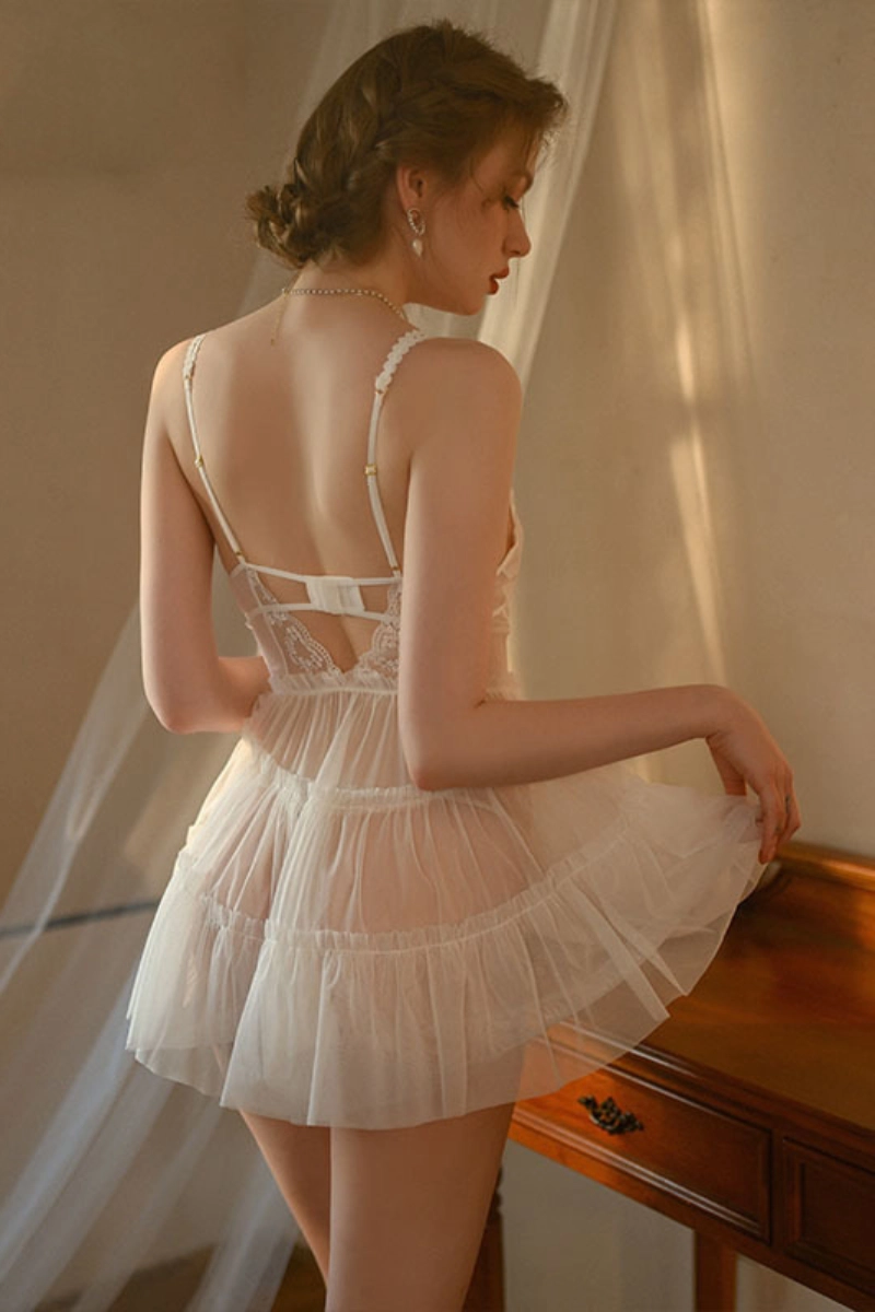 Alt Text: Front view of white custom lace gauze pajamas with soft ruffle layers