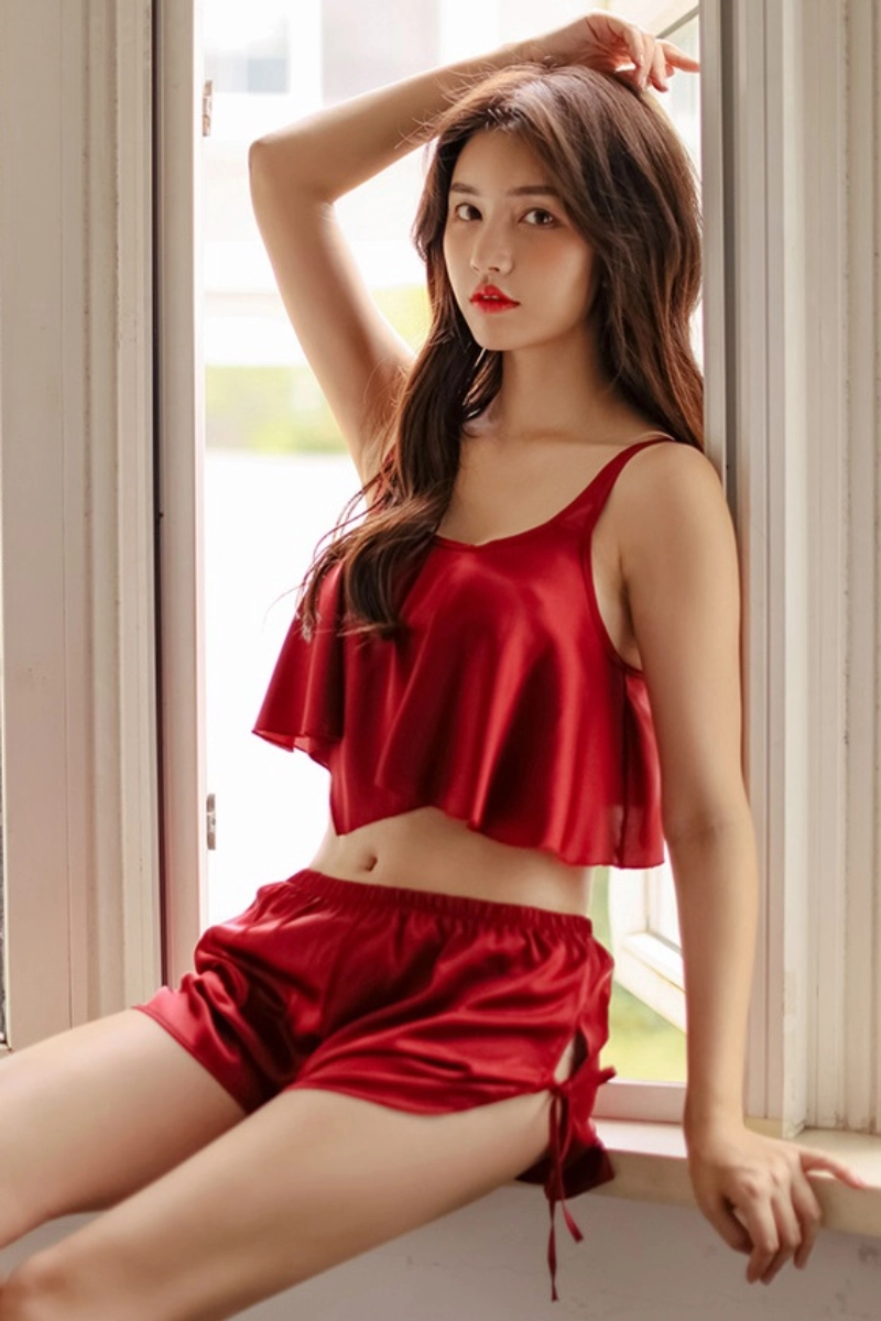 Alt Text:Elegant burgundy lace up pajamas with flowing silhouette