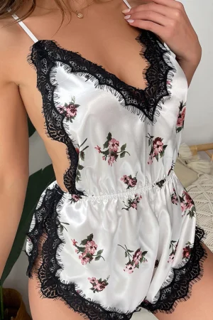 Alt Text: OEM lace holiday pajamas with pink floral print on white satin