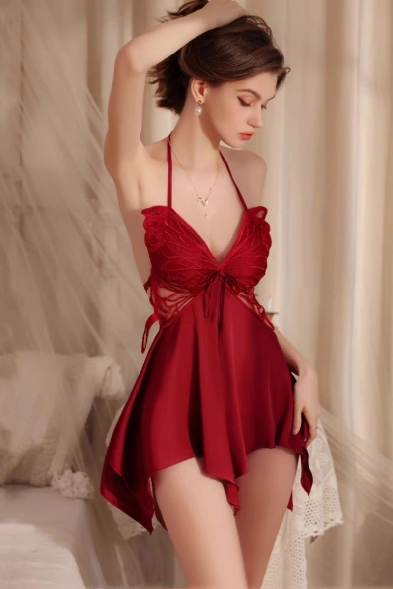 Model wearing red custom lace pajama pants with lace butterfly embroidery