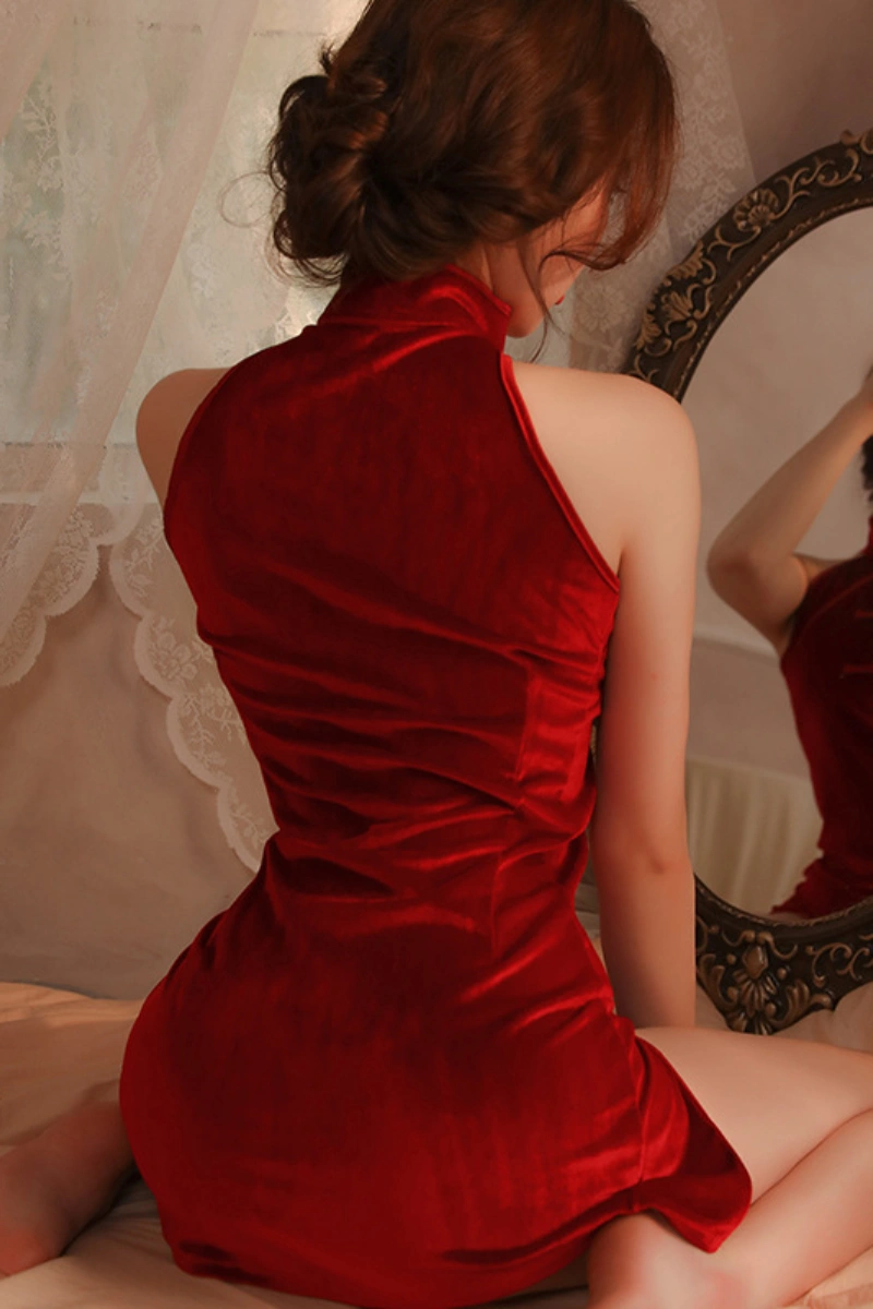 Back view of model wearing wholesale Chinese cheongsam lingerie in red velvet fabric with sleeveless design