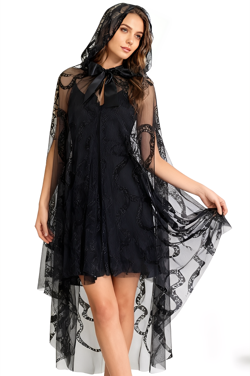 Model wearing a black lace hooded cape with sheer overlay and bow tie closure