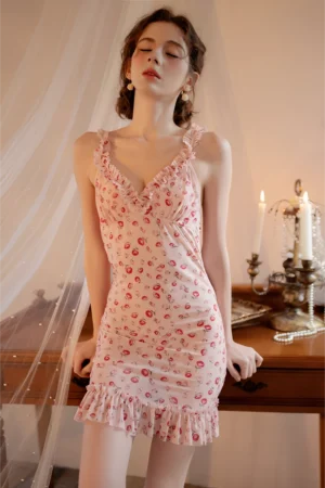 Model wearing a pink floral short lace nightdress with ruffle trim, designed as bulk honeymoon lace pajamas for romantic sleepwear collections.