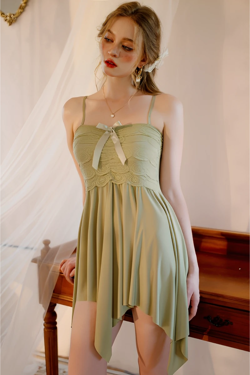 Model wearing green bulk sexy Lace Pajamas with lace bodice, ribbon detail, and asymmetrical hem for B2B lingerie supply