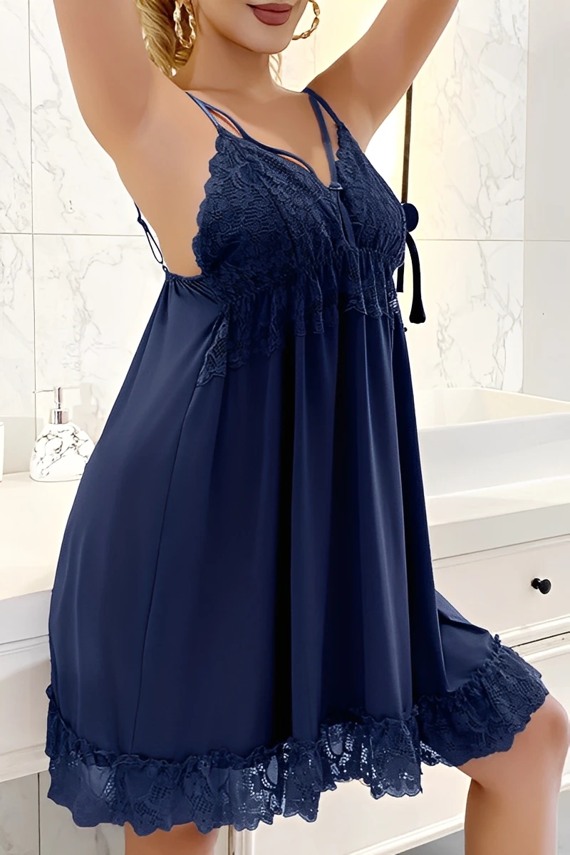 Model wearing navy wholesale lace satin Pajamas featuring dark lace accents and a flowing satin skirt.