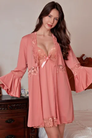 Model wearing a pink lace-trimmed Sexy Nightgown for Honeymoon with flared sleeves and a soft satin finish, ideal for bridal lingerie collections.