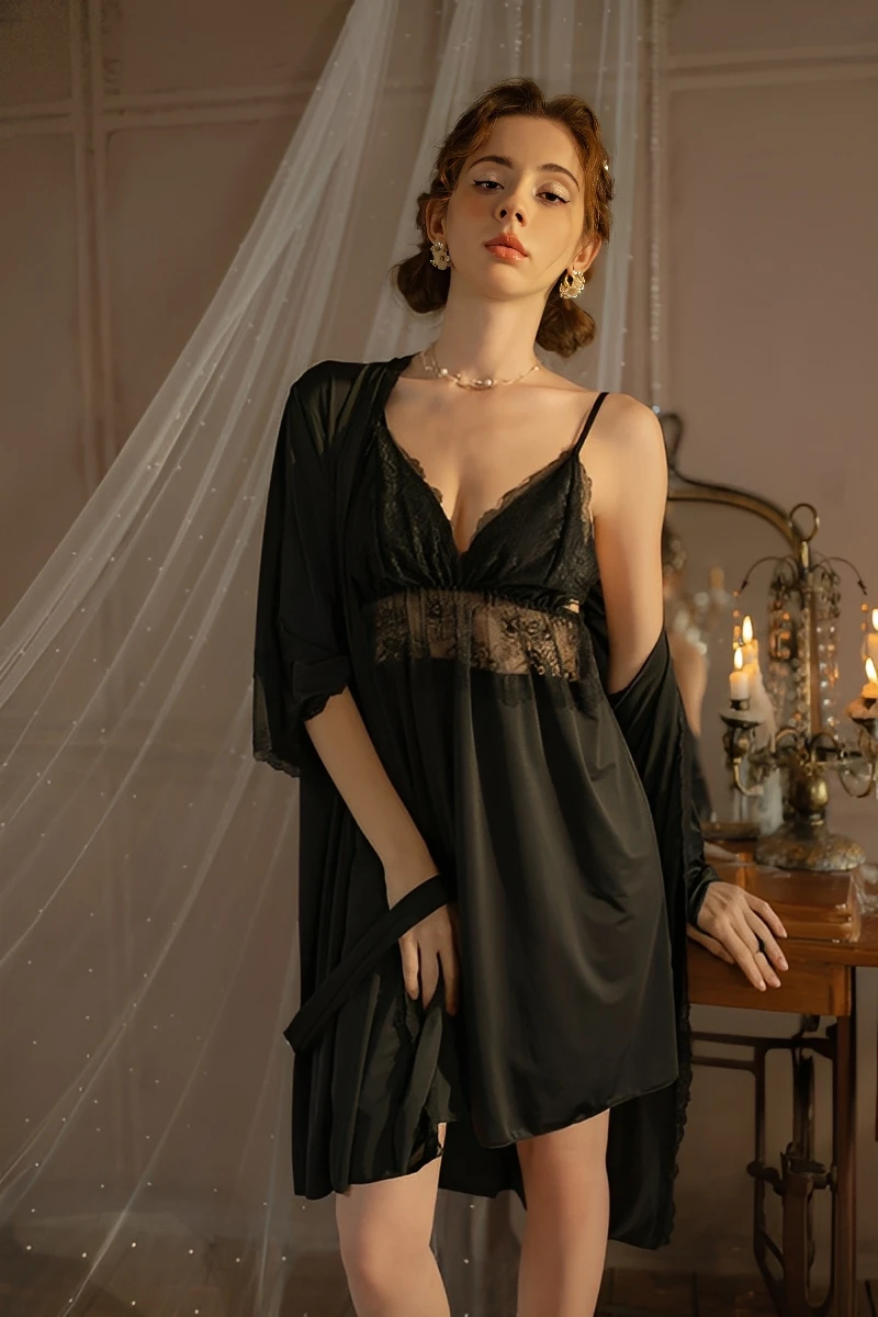 Model wearing black wholesale Sexy Bridal Nightgown with lace bust detail and sheer flowing skirt