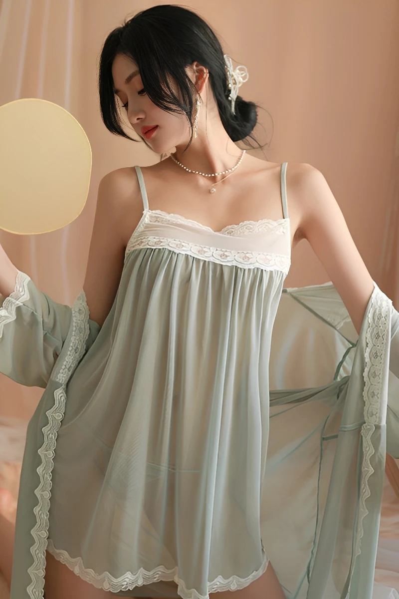 Model wearing light green wholesale Transparent Sexy Nightgown with sheer fabric, lace trim, and slim straps