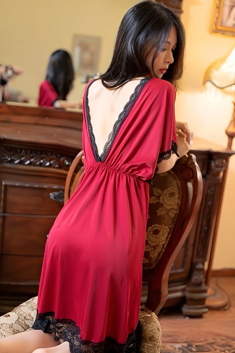 Back view of a red wholesale silk satin lace pajama set featuring a low-back cut and black lace edging.