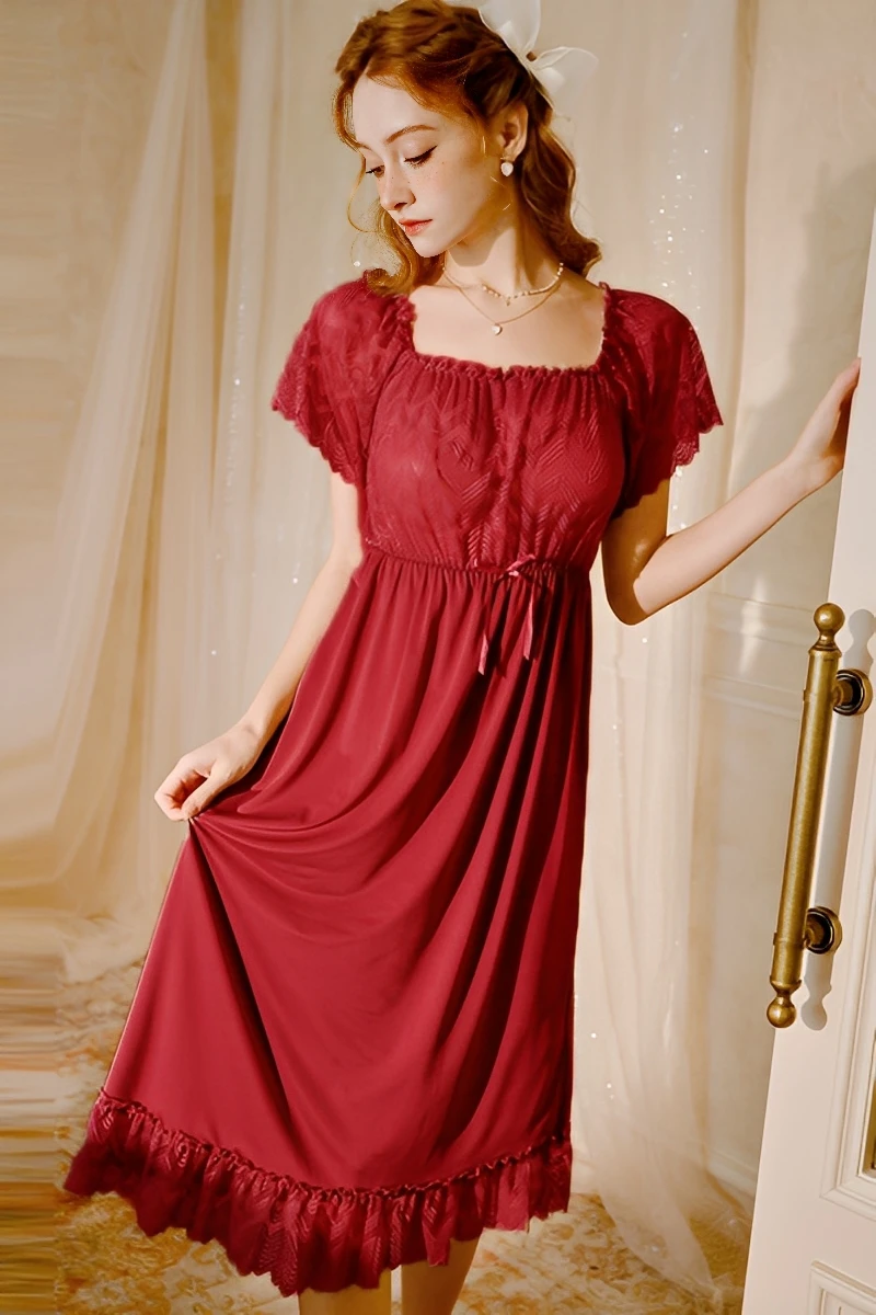 Model wearing wine red b2b lace bridal pajamas with lace bodice, short sleeves, and elegant flowing silhouette