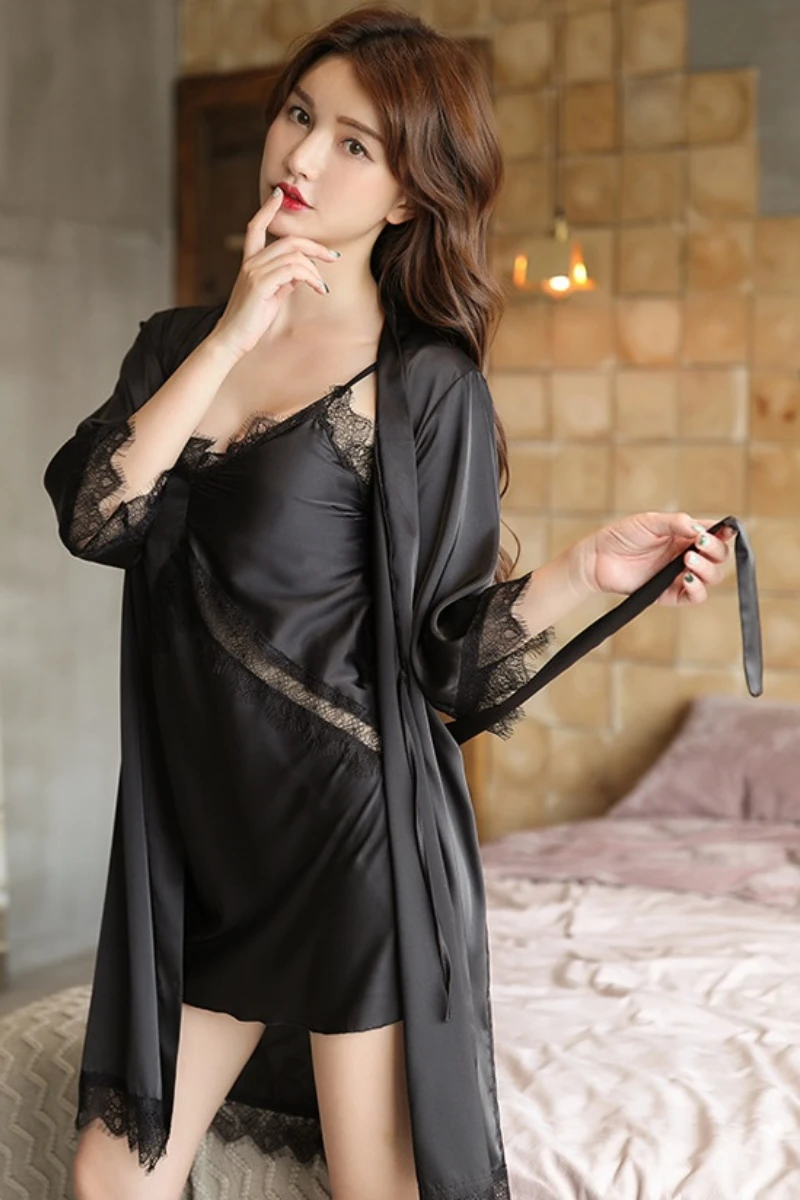 b2b women sexy nightgowns featuring a black satin slip with lace trim and a lightweight matching robe in an elegant bedroom setting