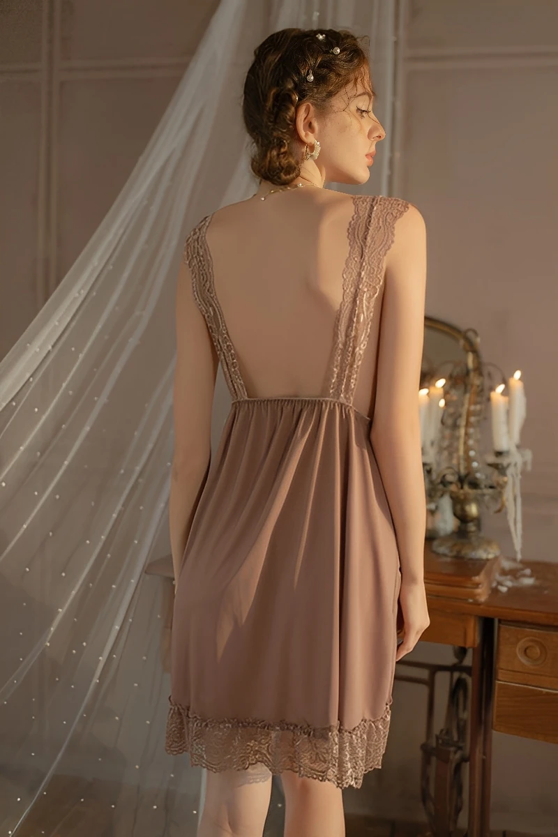 The rear view of a khaki wholesale lace bridal pajamas set showing a stunning low-back design with delicate lace straps and a bow accent.