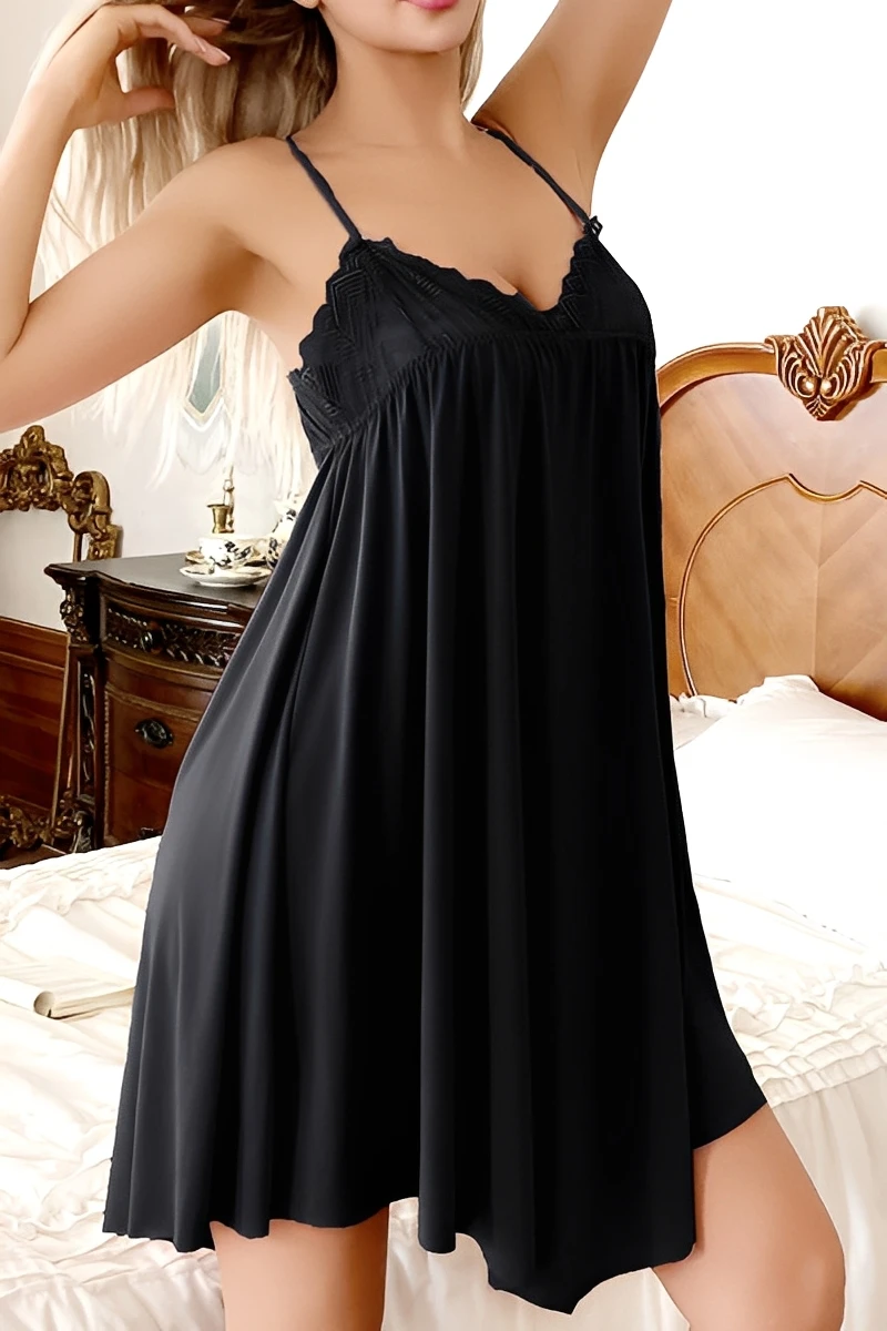 Model in black b2b lace pajama top featuring lace neckline and flowy fabric ideal for clubwear-inspired sleepwear