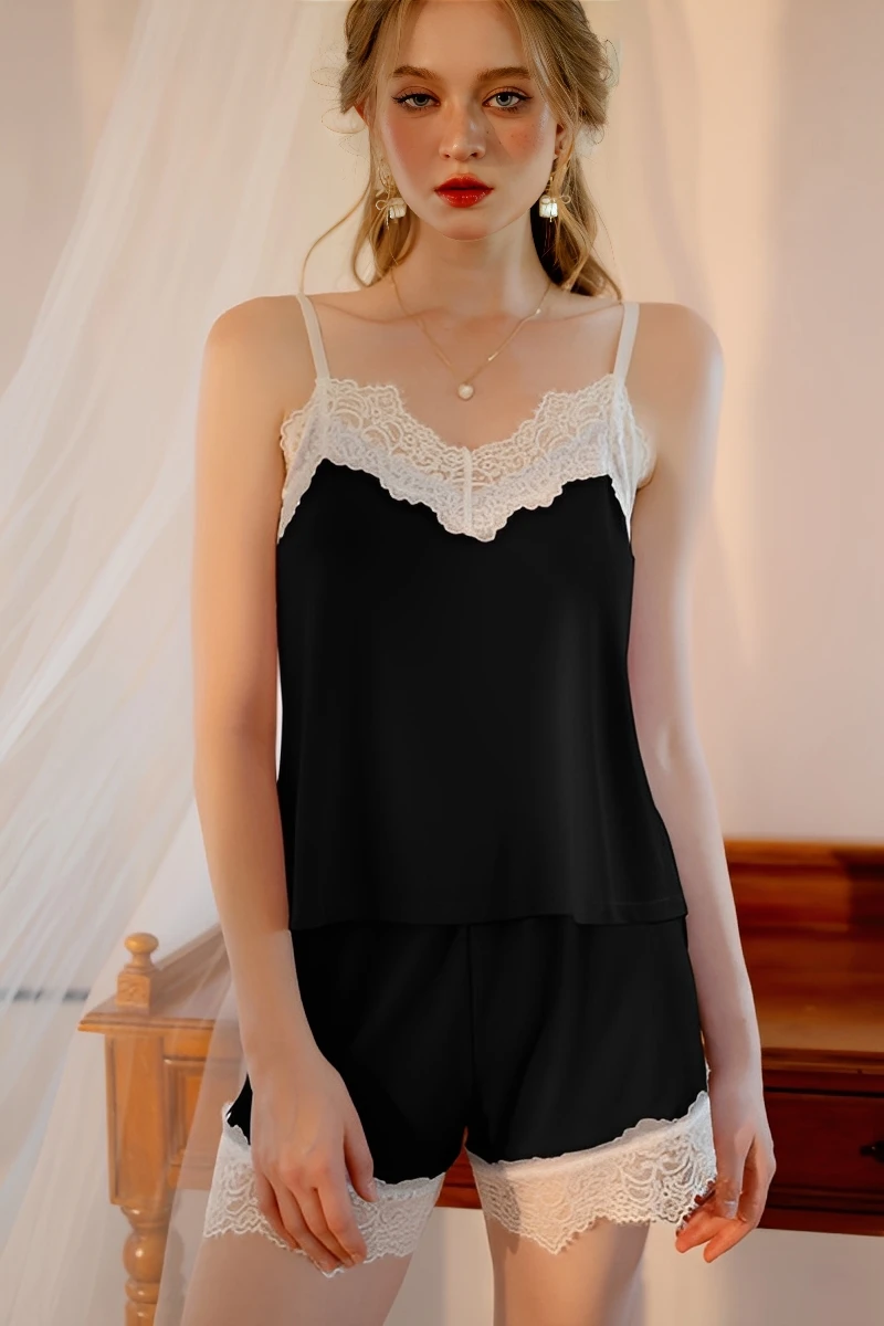 Black lace pajama short set featuring contrast lace trim camisole and matching shorts for women’s loungewear