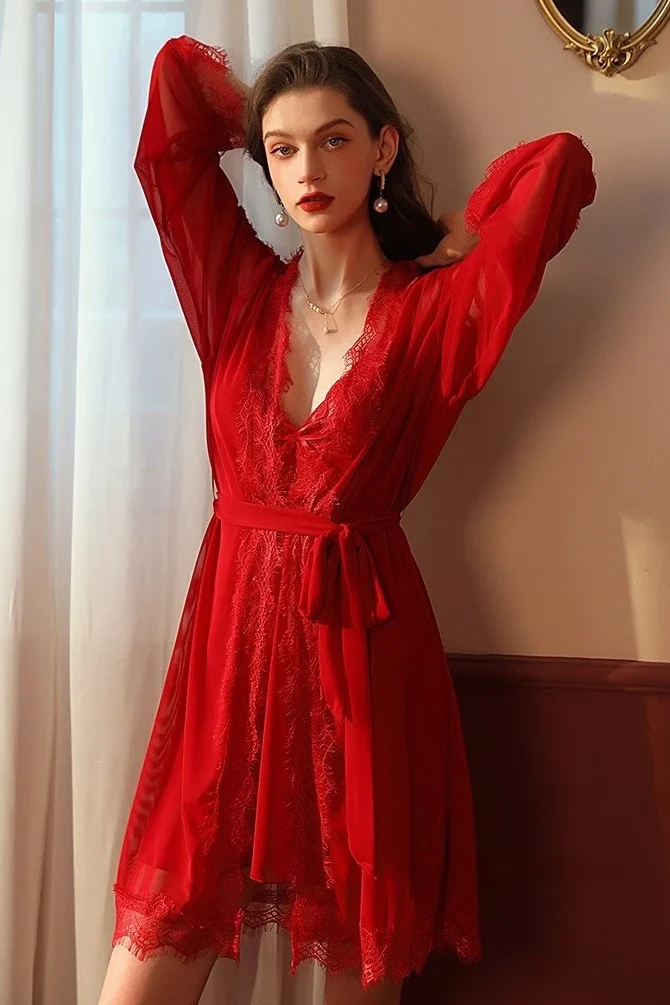 Model wearing a red bulk cotton sexy nightgown with lace inserts, long sleeves, and a soft flowing cotton silhouette for nightwear use