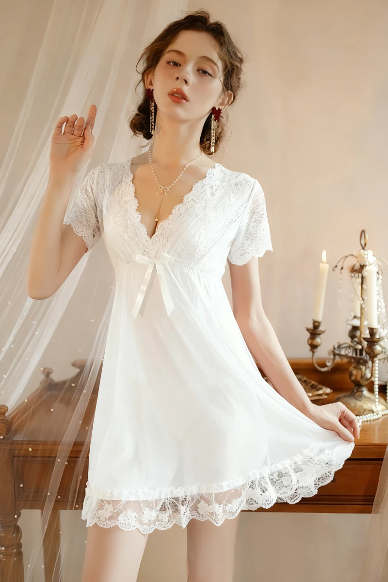 White bulk lace pajama top with V-neck lace detailing, sheer fabric, and short sleeves for wholesale nightwear