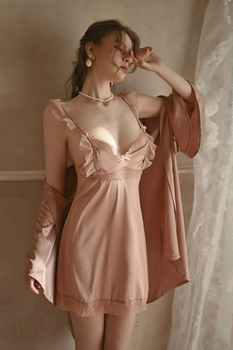 Soft pink satin long nightgown with lace accents and robe, suitable for bulk long sexy nightgowns supply.