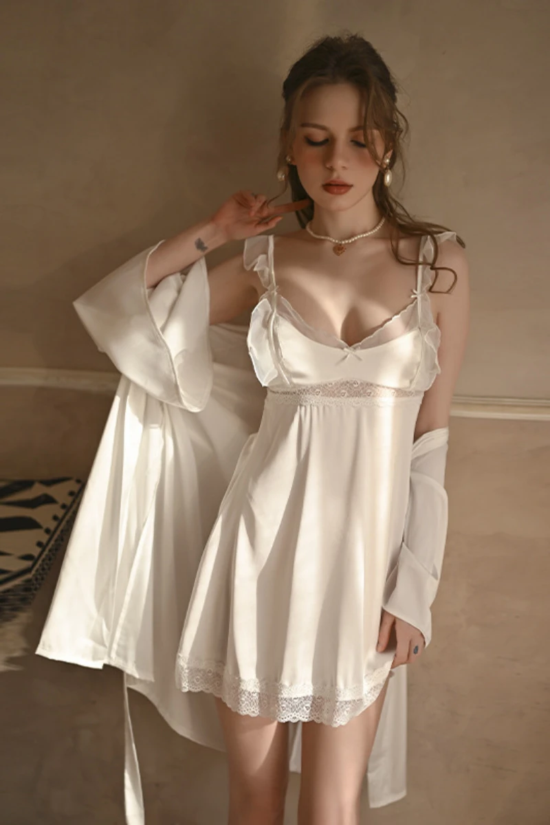Model wearing a white lace-trimmed long nightgown with matching robe, designed for bulk long sexy nightgowns collections.