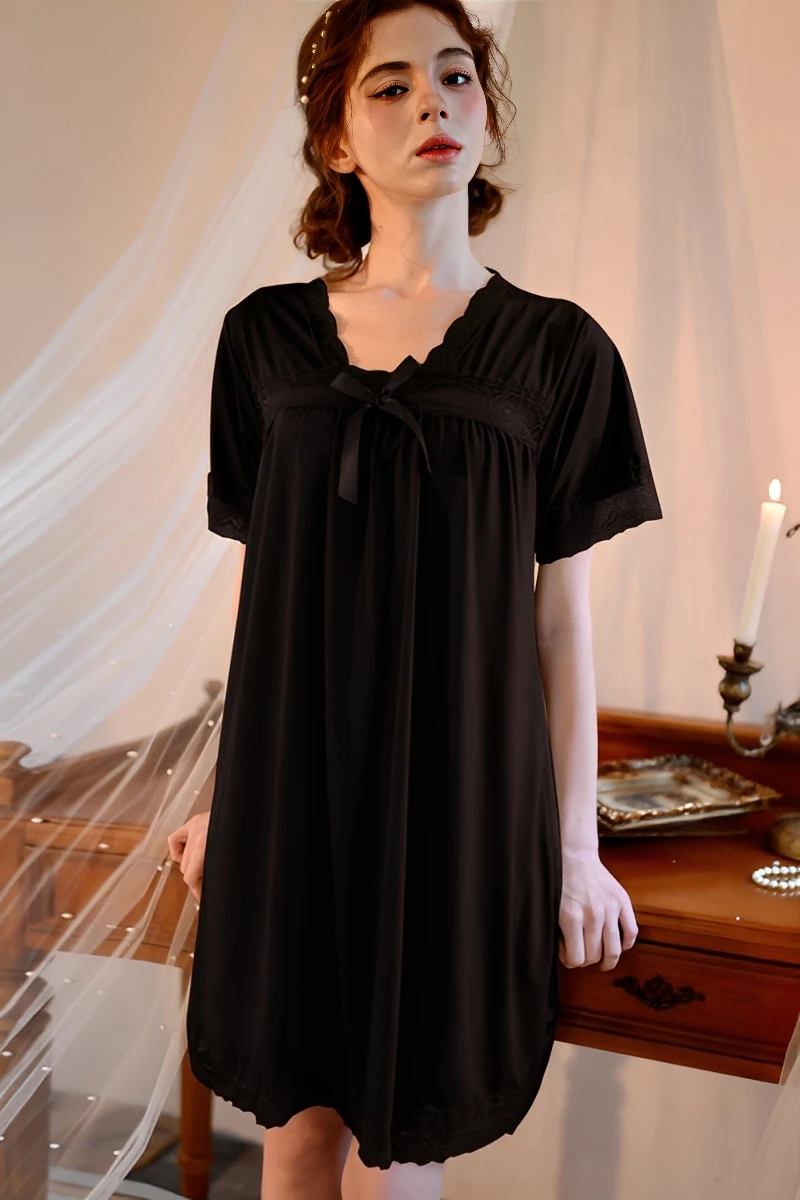 Black nightdress with minimal design presented for bulk pajama lace wholesale supply