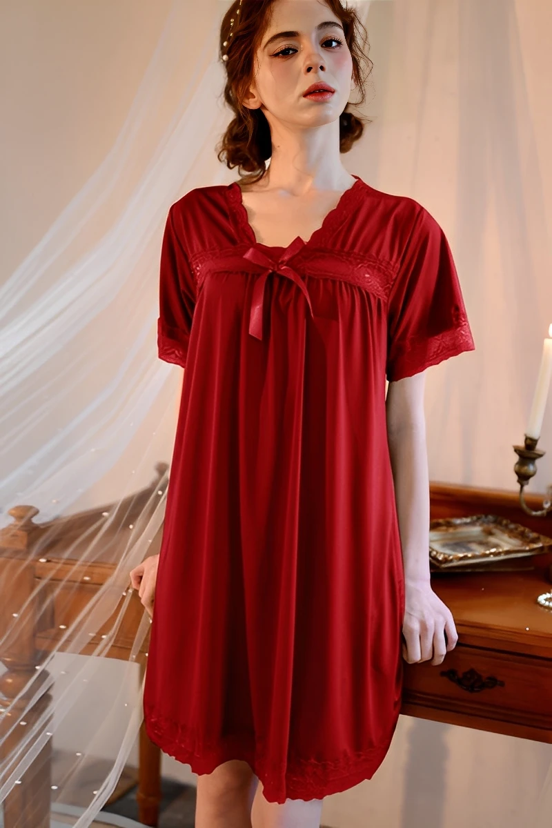 Burgundy nightdress with flowing fabric designed for bulk pajama lace manufacturing orders