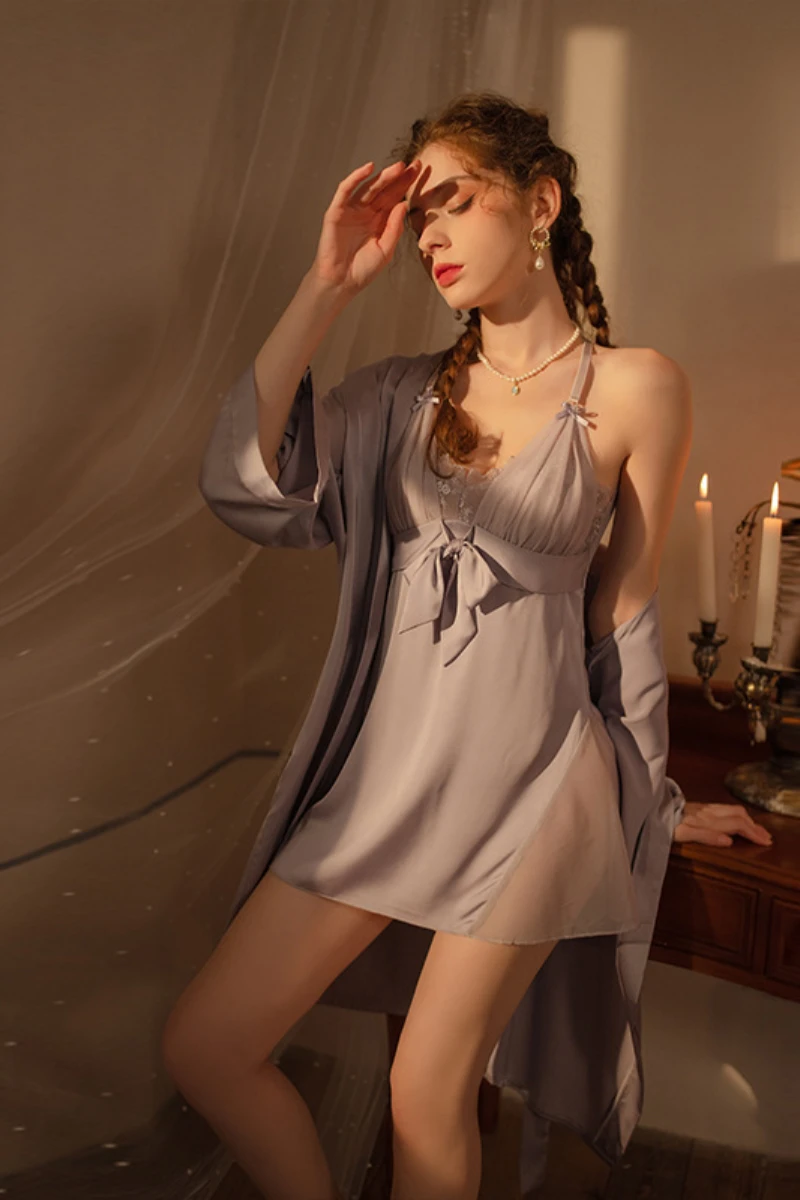 Model showcasing a bulk sexy lingerie nightgown in soft gray satin with adjustable straps and flowing robe for B2B nightwear supply