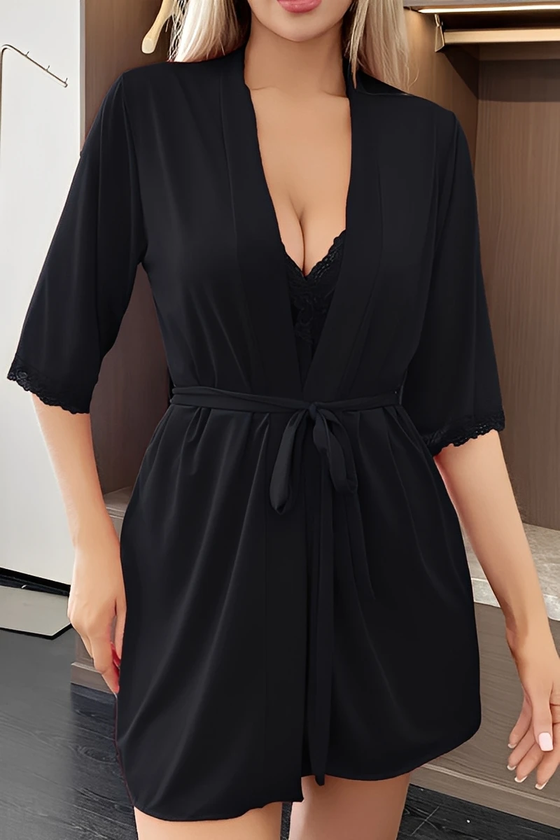 Model wearing a black bulk Strappy Sexy Nightgown with thin straps, smooth fabric, and a matching robe for wholesale supply.