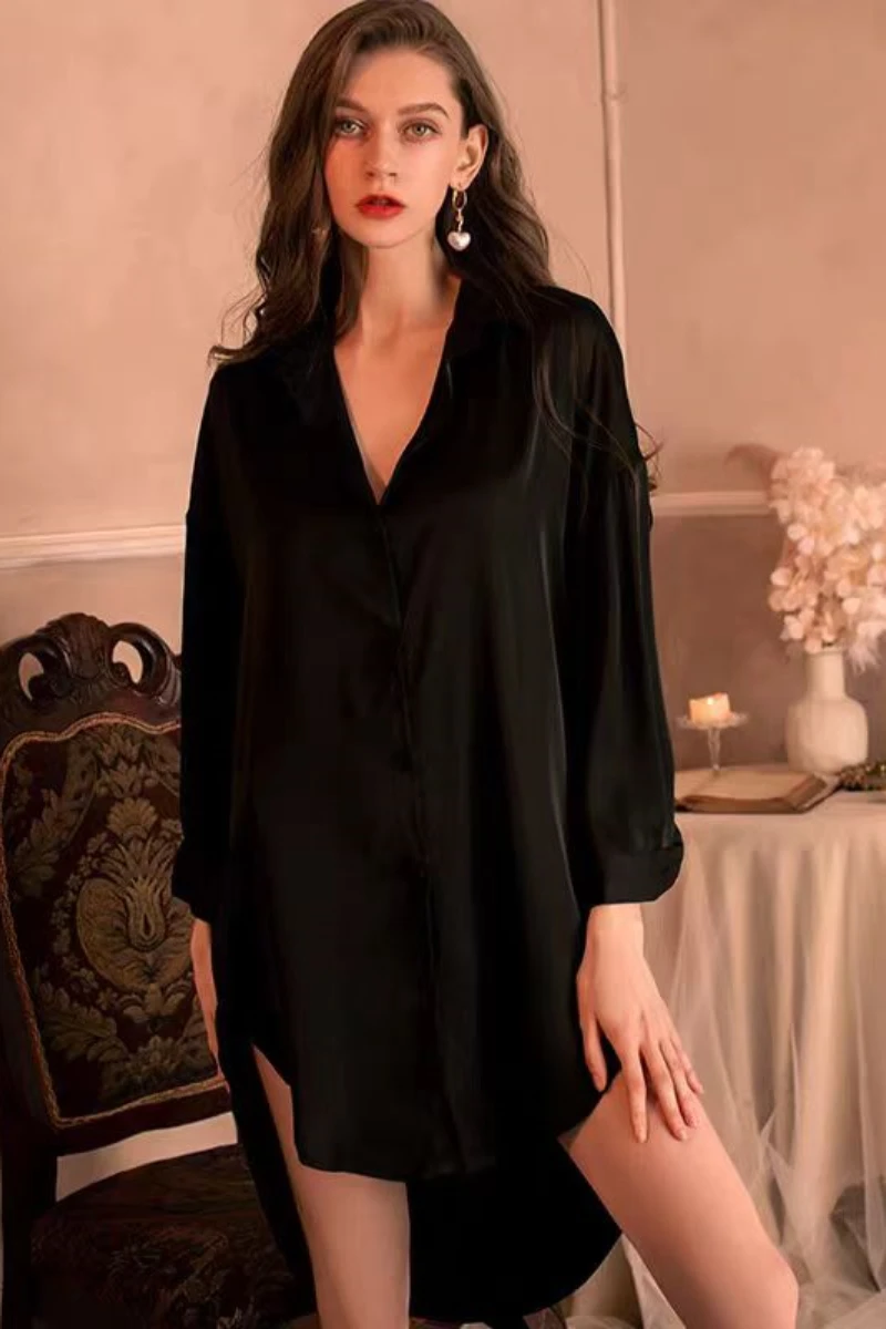 Black satin bulk womens sexy nightgown with deep neckline and long sleeves in elegant indoor setting