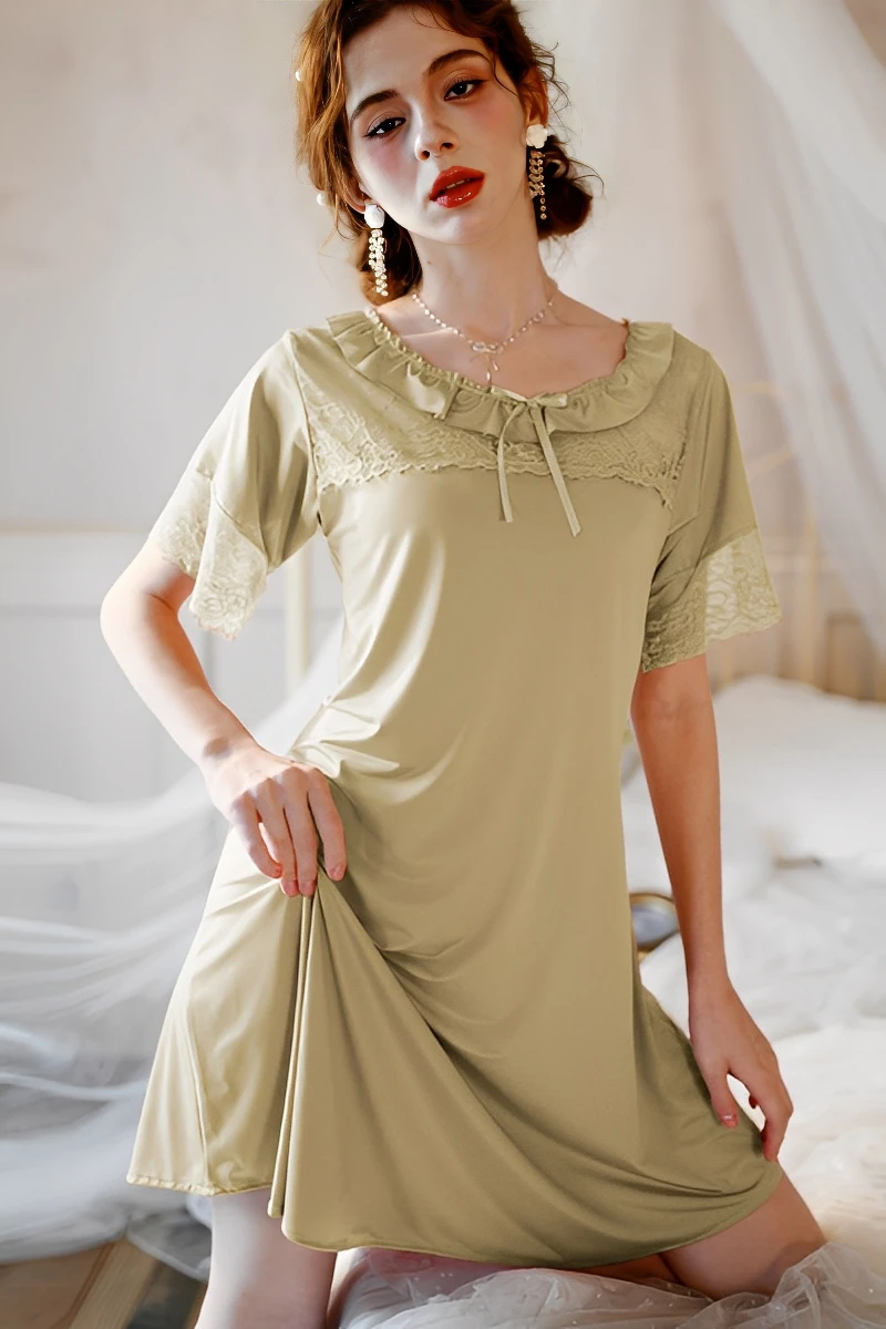 Bulk women's sexy solid color lace pajamas in light green with lace neckline and soft drape.