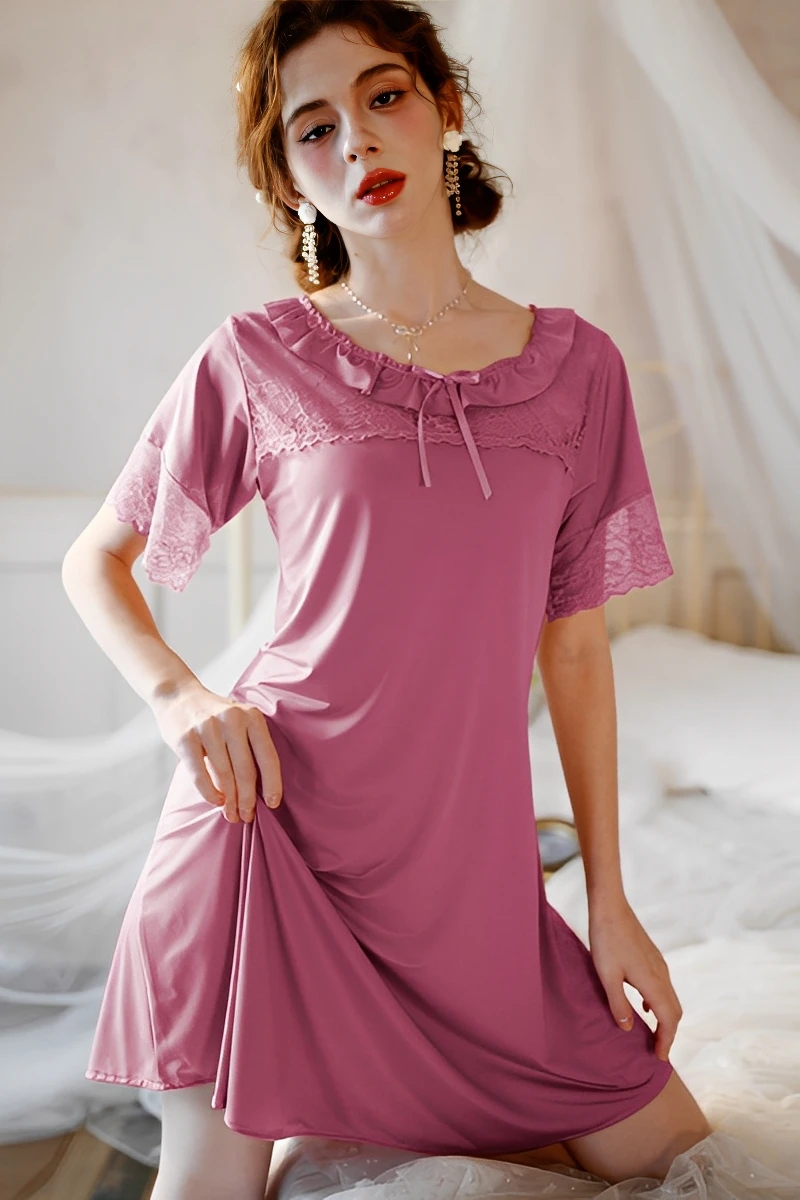 Bulk women's sexy solid color lace pajamas in rose purple with lace neckline and flowing hem.