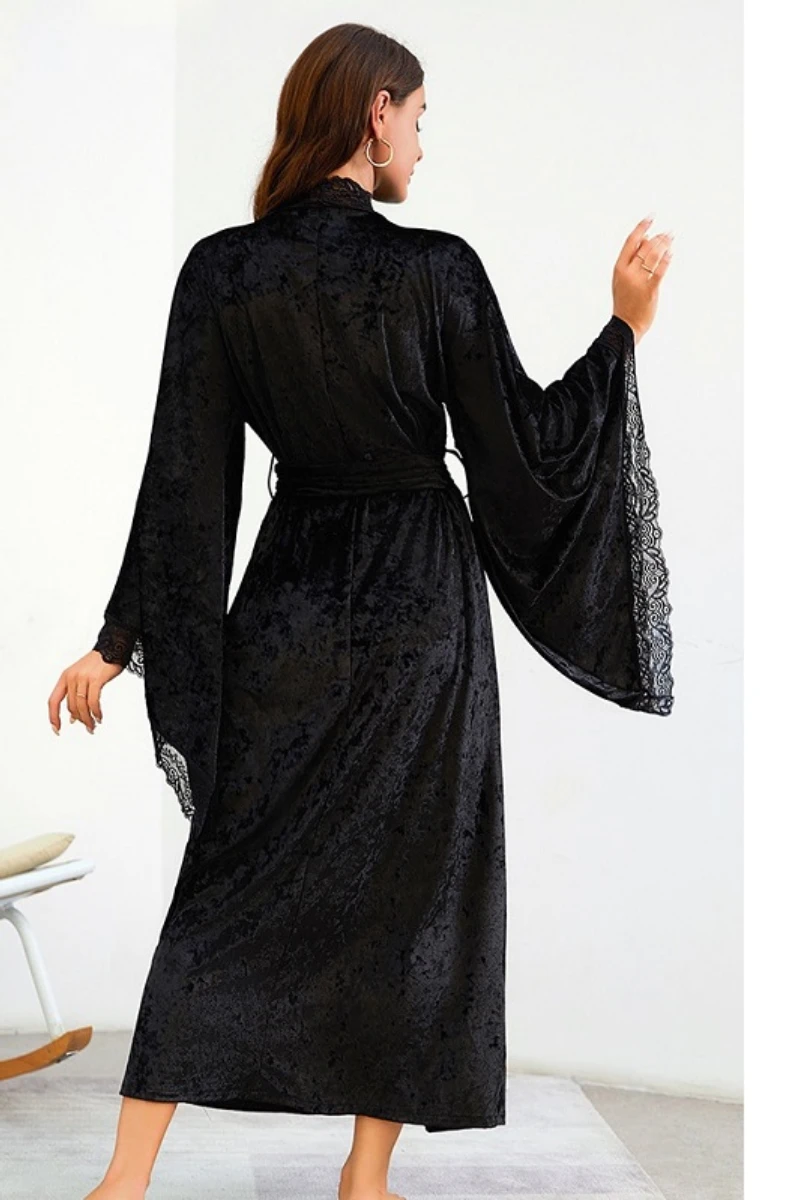 Back view of a black velvet womens sexy nightgown showcasing long draped sleeves and lace-trimmed cuffs.