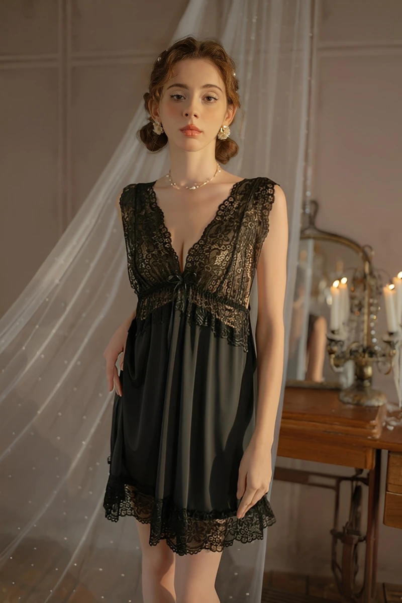 Model wearing a classic black wholesale lace bridal pajamas set with floral lace panels and a flattering A-line skirt, ideal for bulk purchase.