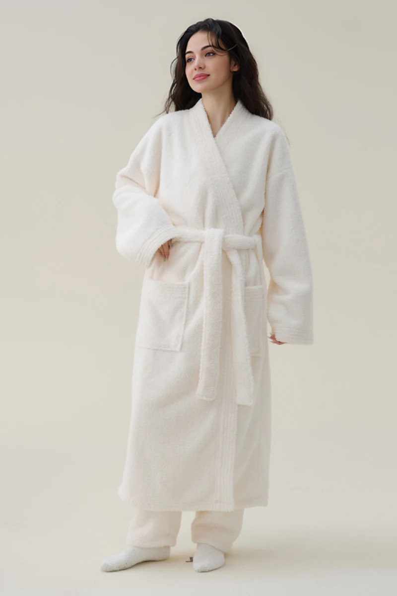 White cotton sexy nightgown with long sleeves, front pockets, and adjustable waist tie for relaxed nightwear use