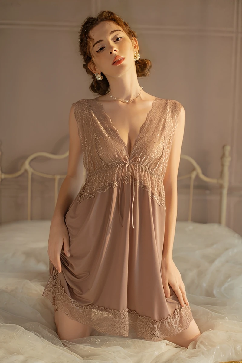 A beautiful model wearing a khaki wholesale lace bridal pajamas set featuring an exquisite lace bodice, deep V-neckline, and flowy silhouette for wedding morning prep.