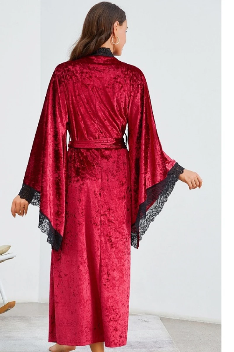Back view of a velvet robe style womens sexy nightgown featuring wide sleeves, black lace cuffs, and a waist tie.