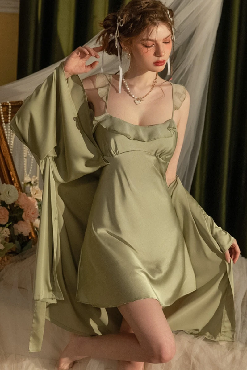 Model styled in a green satin slip nightdress with flowing robe, shown as a wholesale sexy chic nightgown