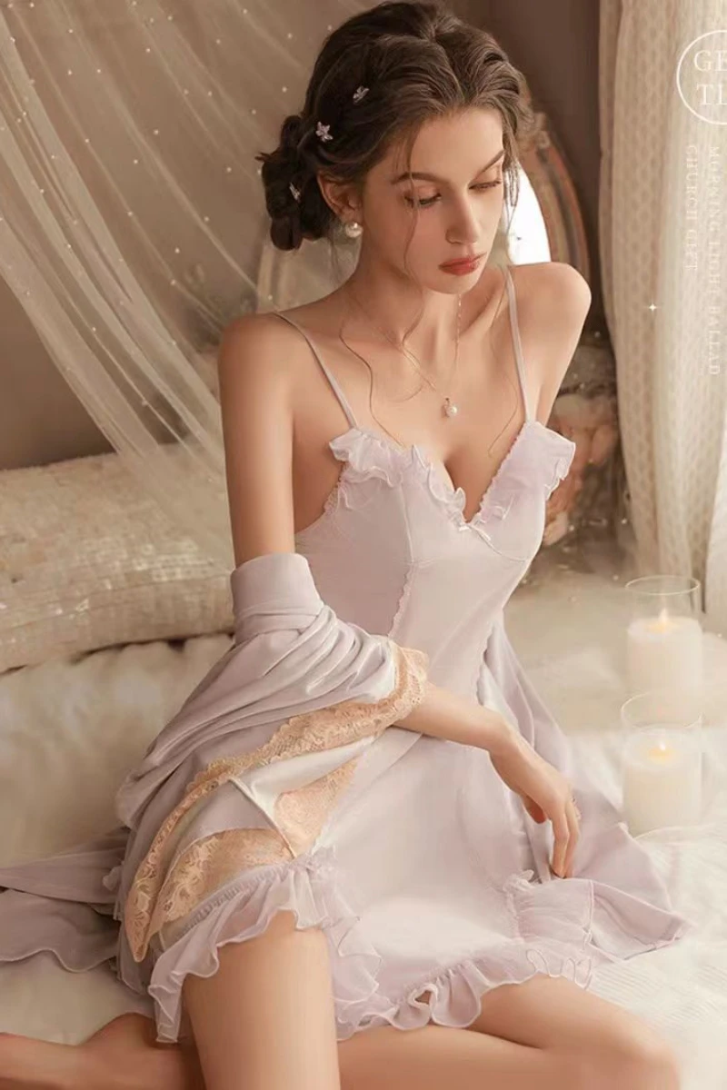 Model wearing a lavender satin nightdress with ruffle details and robe, presented as a b2b sexy chic nightgown