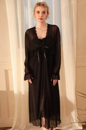 Front view of lace sexy nightgowns in black sheer material with lace cuffs and flowing long-length silhouette