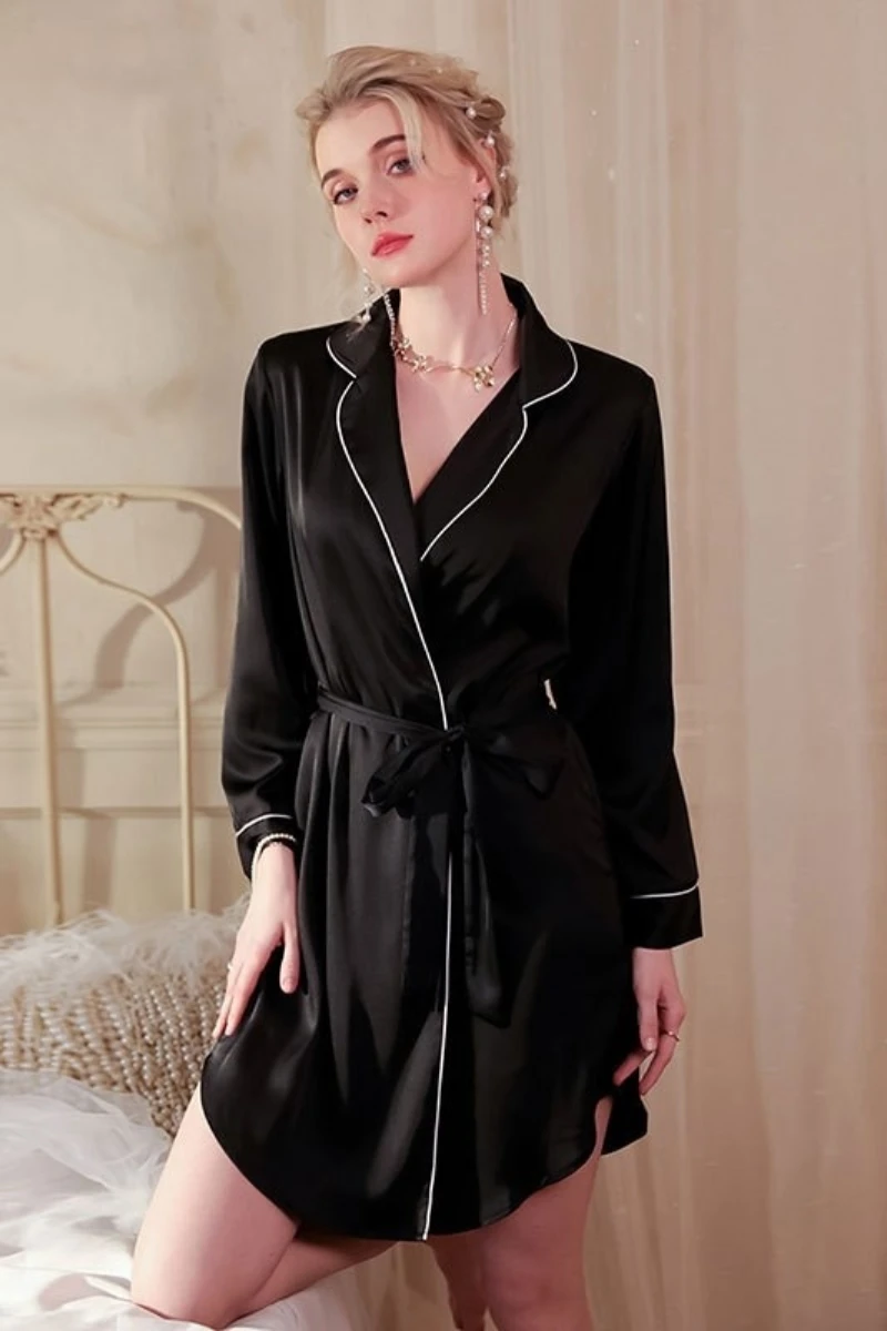 Model wearing long sexy nightgowns in black with a silky satin finish, wrap front design, and adjustable waist tie for an elegant nighttime look.