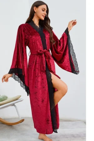 Front view of a long velvet womens sexy nightgown with deep V neckline, lace trim, and adjustable waist belt.