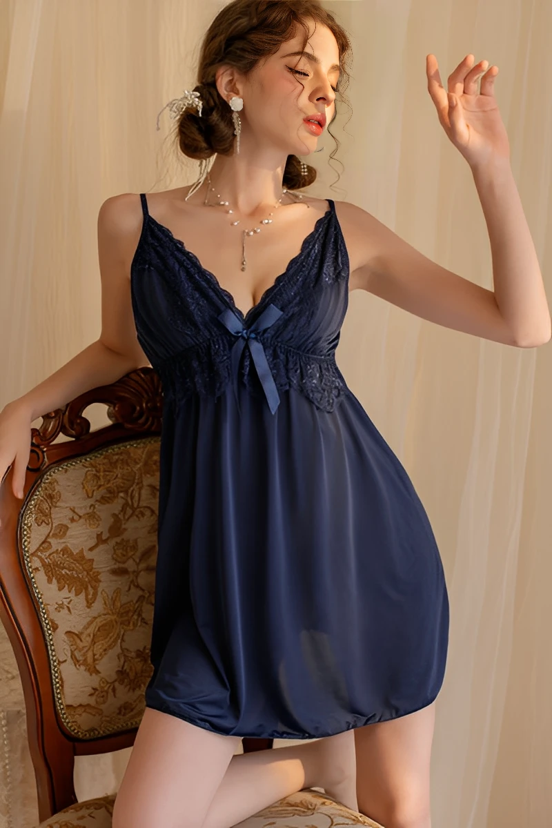 Silk lace pajama set in navy blue with deep V neckline, lace overlay, and silky lightweight fabric.