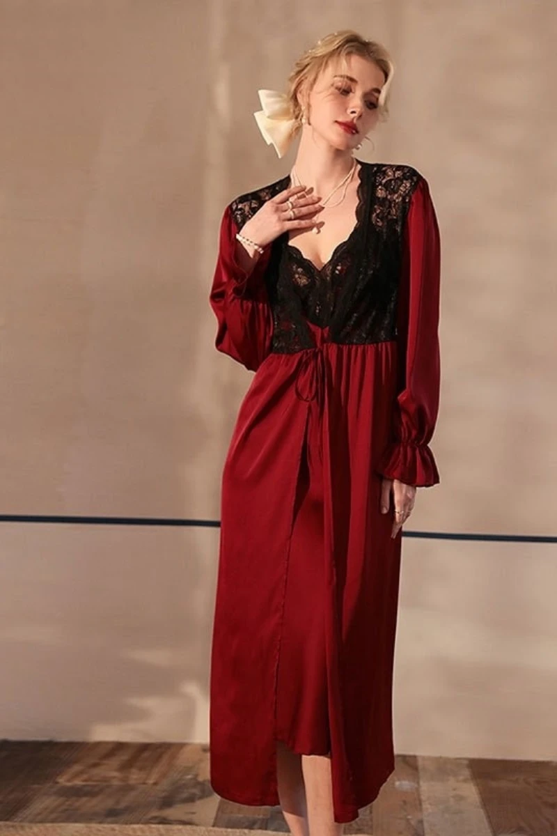Model in red lace long sleeve nightgown sexy with deep V lace bodice and flowing skirt