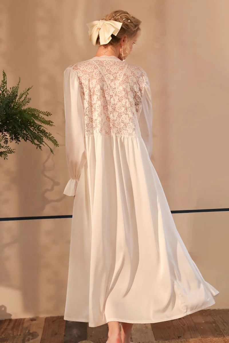 Back view of white lace nightgown sexy with sheer lace panel and relaxed flowing skirt