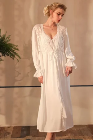 Model wearing white lace long sleeve nightgown sexy style with deep V neckline and flowing silhouette