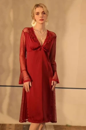 Model wearing nightgowns sexy red lace nightdress with sheer long sleeves and V-neck design in an elegant indoor setting