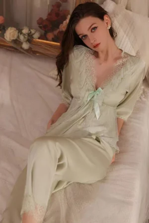 Model styled in oem long sexy nightgowns with a ribbon accent, lace neckline, and smooth long-length fabric ideal for women’s evening sleepwear.