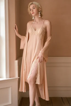Model wearing private label long sexy nightgowns in champagne color, featuring a long lace slip dress with side slit and matching lightweight robe
