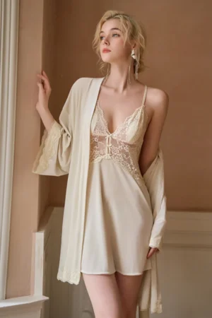 Model wearing an ivory private label sexy cotton nightgown with delicate lace bodice and matching lightweight robe, elegant and feminine homewear design.