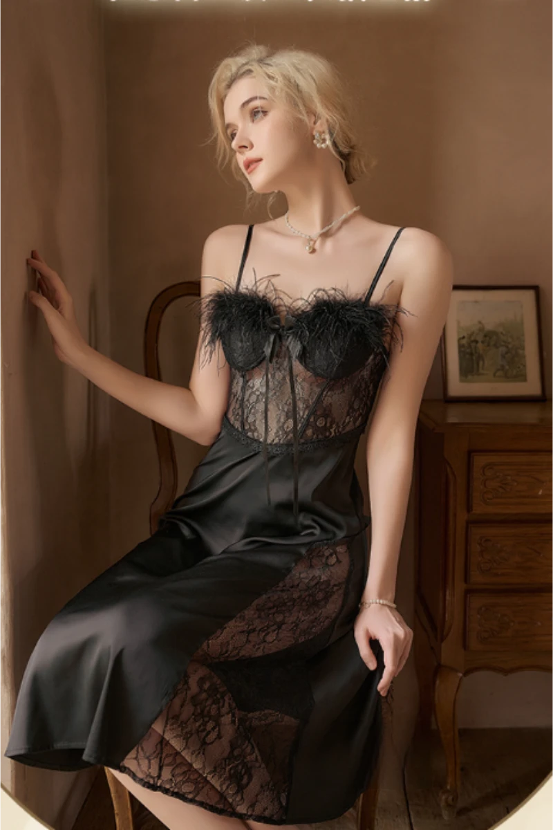 Private label sexy long nightgowns in black, showing lace bodice construction, feather trim at the neckline, and a long flowing silhouette