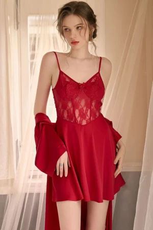 Model wearing private label sexy nightgown women in red, featuring a sheer lace bodice, thin straps, and a flowing lightweight skirt