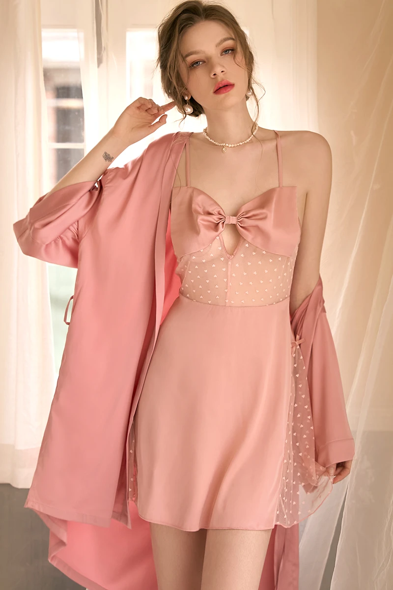 Private label sexy nightgowns for women in soft pink, showing sheer panel construction, bow detail, and a matching lightweight robe